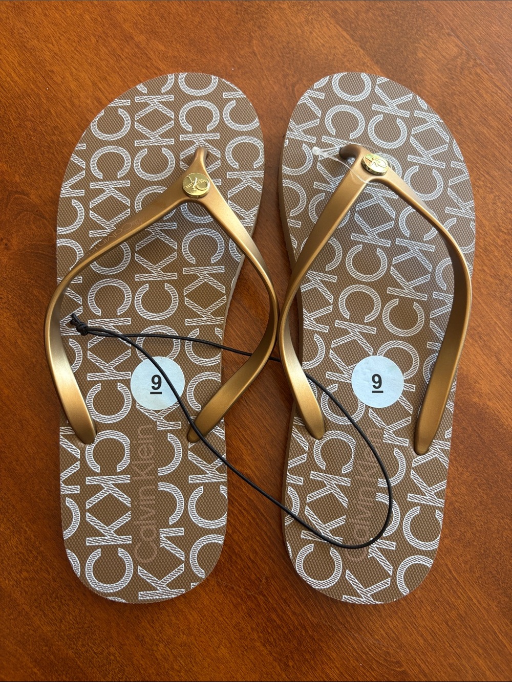 Calvin Klein Brown Logo Flip Flops with Bronze Straps